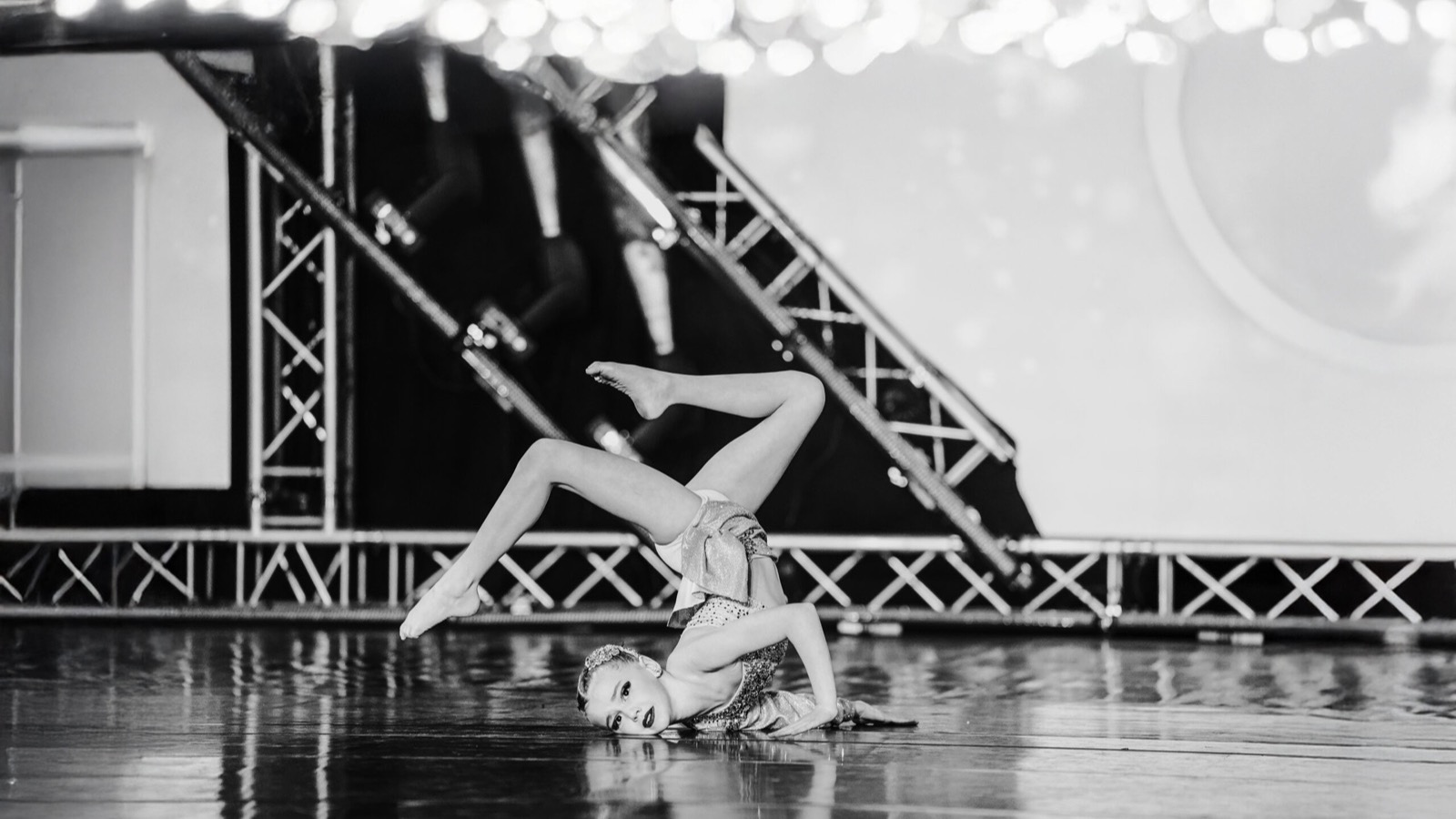 A dancer from BORN Dance Academy mid-routine on stage